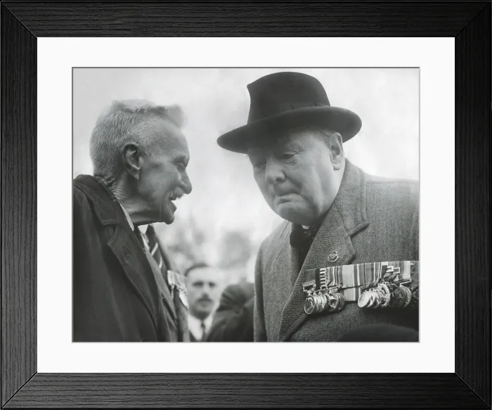 Framed Print : Winston Churchill, wearing his military medals, listening to an elderly man. Ca. 1945 - (BSLOC_2014_17_46)