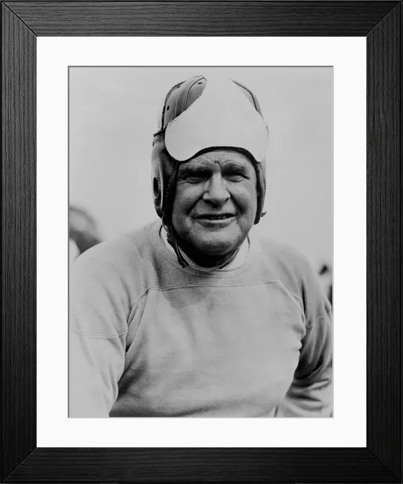 Framed Print : Coach Glenn Pop Warner, wearing football headgear, 1933. Warner was in his first year as coach of Temple University. (BSLOC_2013_9_40)