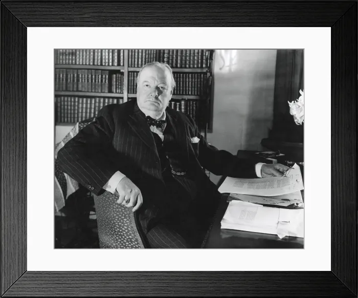 Framed Print : Former Prime Minister Prime Winston Churchill, at his desk in Werterham, Kent. April 1948. - (BSLOC_2014_17_51)