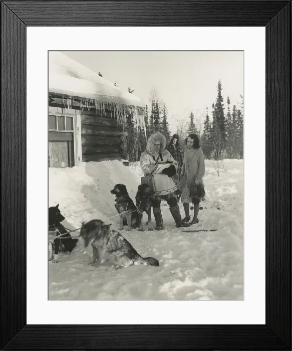 Framed Print : 1940s Census taker in Fairbanks, Alaska. He traveled by dog sled to reach this woman's home