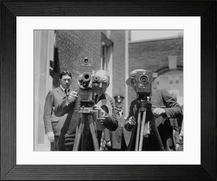 Framed Print : Republican Presidential nominee Warren Harding operating a newsreel camera. At right is a photojournalist at the Senator Harding's Washington home. Ca. June 1920 Framed Print : Republican Presidential nominee Warren Harding operating a newsreel camera. At right is a photojournalist at the Senator Harding's Washington home. Ca. June 1920