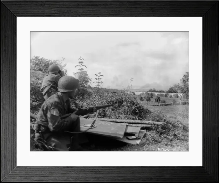Framed Print : Two U.S. soldiers observe smoke from the Battle of the Falaise Pocket. They were on a reconnaissance patrol, behind the Castle of Bourg St. Leonard Framed Print : Two U.S. soldiers observe smoke from the Battle of the Falaise Pocket. They were on a reconnaissance patrol, behind the Castle of Bourg St. Leonard
