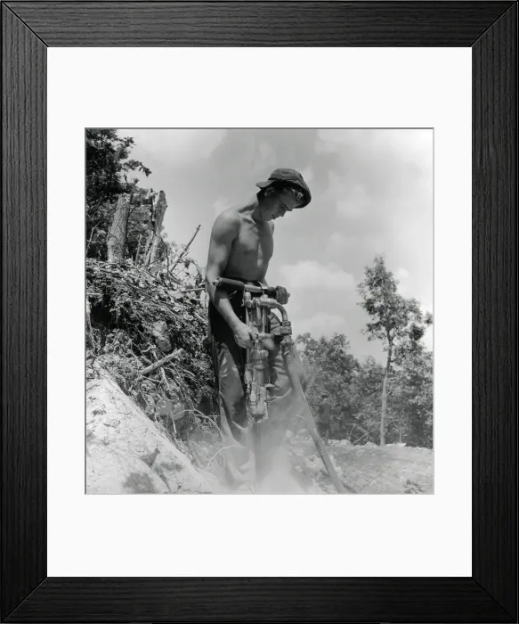 Framed Print : CCC enrollee drilling holes for dynamite shots. The Explosion Course also offered training in the handling and use of dynamite. Camp Triangle, Salem, Virginia, July 26, 1940