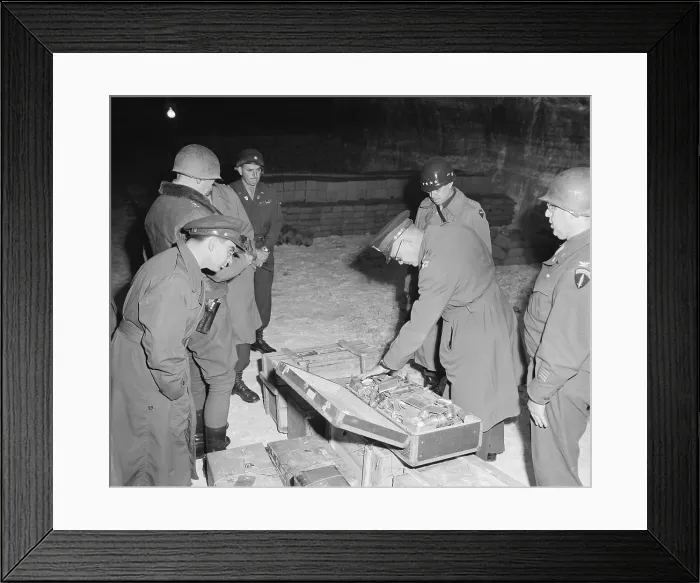 Framed Print : U.S. commanders examine a suitcase of silverware in the Merkers salt mine in Nazi Germany
