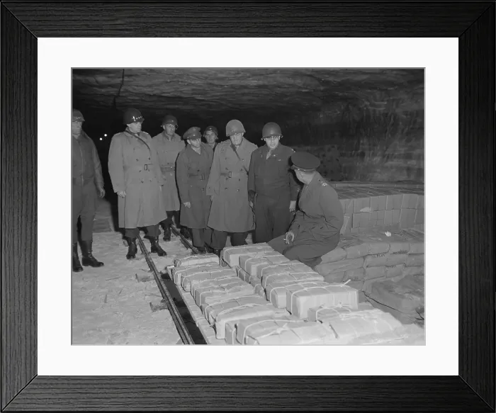 Framed Print : U.S. commanders tour German Merkers salt mine where Nazi treasure was hidden. Gen. Eisenhower is seated, with Gens. Patton and Bradley at left. Eisenhower is speaking to Gen Framed Print : U.S. commanders tour German Merkers salt mine where Nazi treasure was hidden. Gen. Eisenhower is seated, with Gens. Patton and Bradley at left. Eisenhower is speaking to Gen
