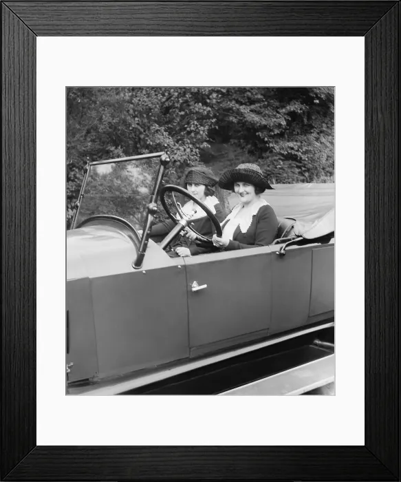 Framed Print : Young women driving a convertible in Washington, D.C. Ca. 1920. (BSLOC_2015_16_233)