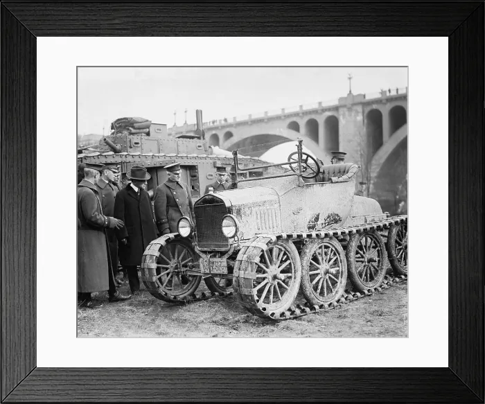Framed Print : Henry Ford (1963-1947), and Military officers, inspect a multi-wheeled vehicle with caterpillar tracks. 1921