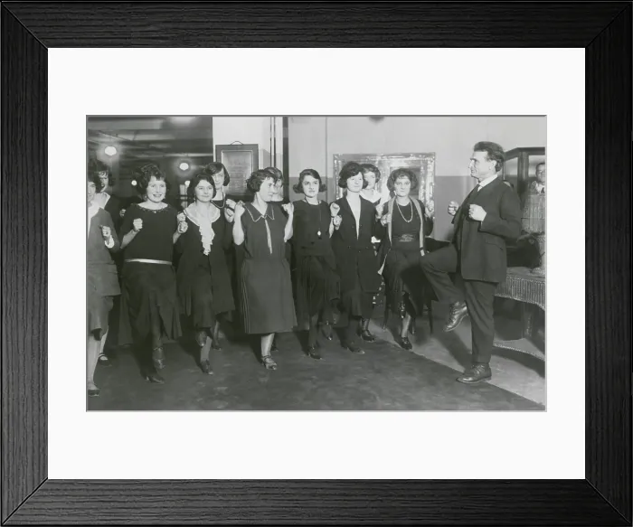 Framed Print : Bernarr Macfadden exhorting employees to exercise in his NYC publishing office, 1922