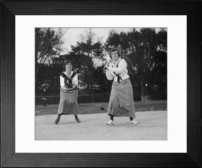 Framed Print : Young women playing baseball in middy shirts and long skirts in 1919. Washington, D.C. (BSLOC_2015_16_236) Framed Print : Young women playing baseball in middy shirts and long skirts in 1919. Washington, D.C. (BSLOC_2015_16_236)