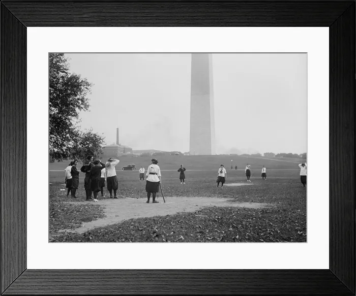 Framed Print : Young women in bloomers and middy shirts playing baseball on the National Mall. Oct 19, 1919. Washington, D.C. (BSLOC_2015_16_237)