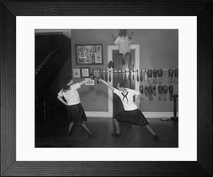 Framed Print : Young women in bloomers and middy shirts fencing. May 14, 1925 at Western High School. Washington, D.C. (BSLOC_2015_16_238) Framed Print : Young women in bloomers and middy shirts fencing. May 14, 1925 at Western High School. Washington, D.C. (BSLOC_2015_16_238)