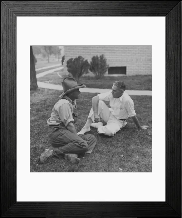 Framed Print : Rex Tugwell (1891-1979), confers with farmer on lawn of the courthouse in Springfield, Colorado in 1936