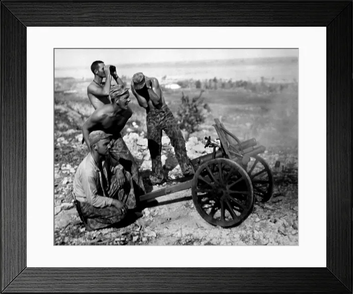 Framed Print : Marines fire a captured Japanese mountain gun in Garapan, Saipan, July 1944. (BSLOC_2013-12_212)
