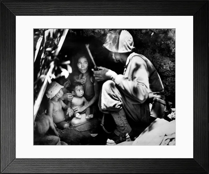 Framed Print : Marine patrol on Saipan found a Japanese family sheltering in a hillside cave, June 21, 1944 Framed Print : Marine patrol on Saipan found a Japanese family sheltering in a hillside cave, June 21, 1944