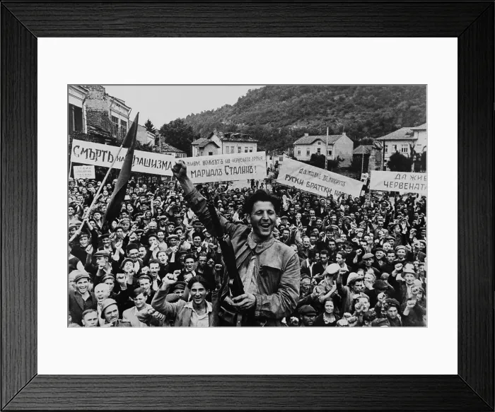 Framed Print : World War 2 armistice celebrations in Lovech, Bulgaria, Sept. 1944. Young man in front and the crowd make the clenched fist, an anti-fascist salute