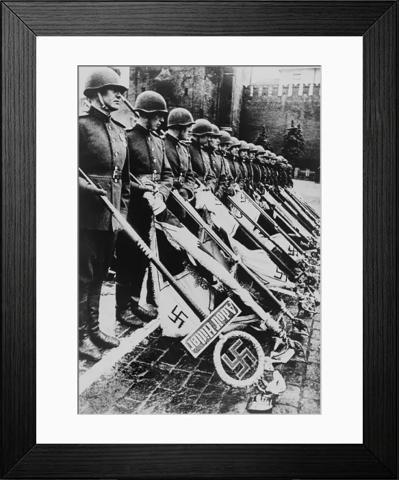 Framed Print : Russian victory parade in Moscow at the end of World War 2, June 24, 1945. Soviet soldiers holding Nazi standards to the ground during a victory parade in Red Square