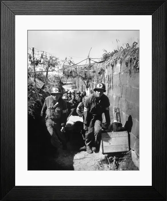 Framed Print : U.S. Medics remove a casualty from the battle field to an aid station. Near Brest, France, August 28, 1944. World War 2. (BSLOC_2014_2_148) Framed Print : U.S. Medics remove a casualty from the battle field to an aid station. Near Brest, France, August 28, 1944. World War 2. (BSLOC_2014_2_148)