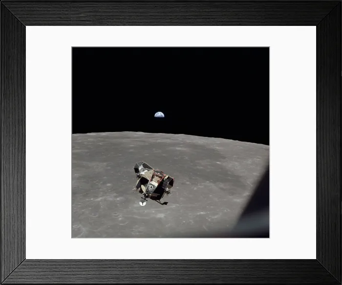 Framed Print : The Apollo 11 Lunar Module ascending from Moon's surface. In the background is Mare Smythii with the Earth on horizon. July 20, 1969