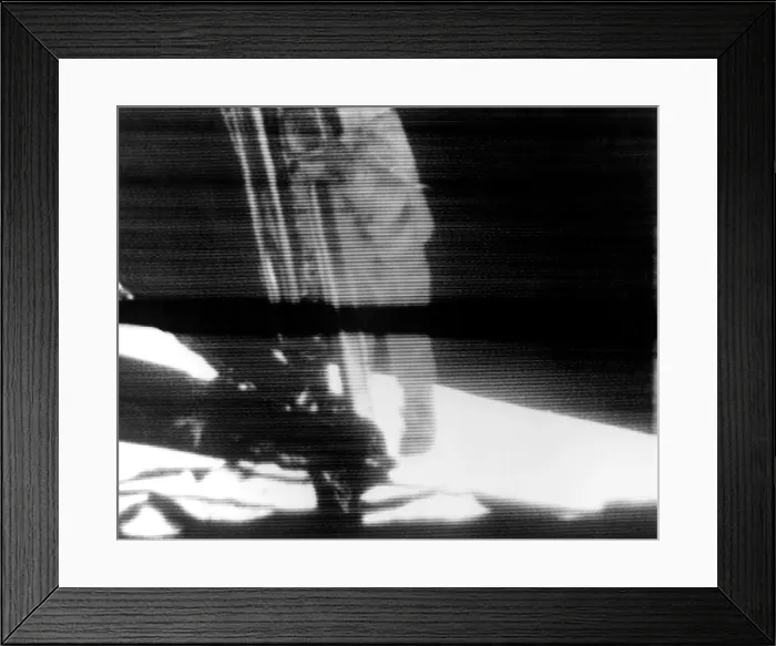 Framed Print : One Small Step for Man, One Giant Step for Mankind. Neil Armstrong exits the Lunar Module Eagle to the surface of the Moon