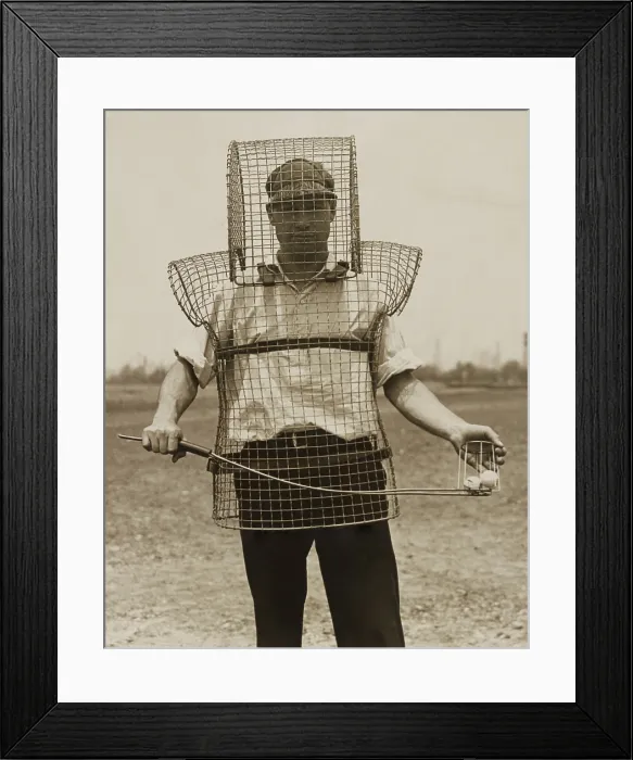 Framed Print : Mouse-trap armor is the newest safety device seen on California golf courses in 1920s Framed Print : Mouse-trap armor is the newest safety device seen on California golf courses in 1920s