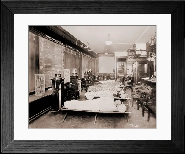 Framed Print : Wall Street clerks sleeping in office due to excessive work caused by heavy stock trading. New York City, October 23, 1915