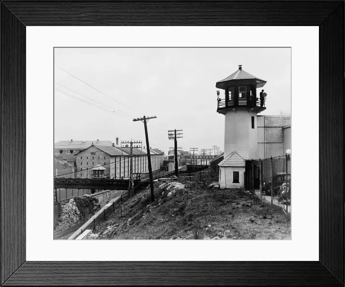 Framed Print : Exterior view of Sing Sing Prison in Ossining New York showing guard tower and cell block. 1938