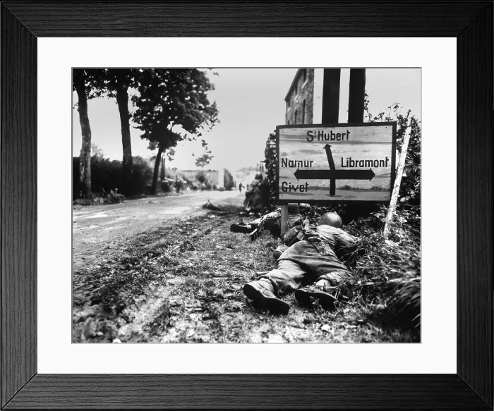 Framed Print : U.S. Soldiers pinned down by German small arms fire in the Belgian town of Libin. Sept. 7, 1944. World War 2. (BSLOC_2014_2_170)