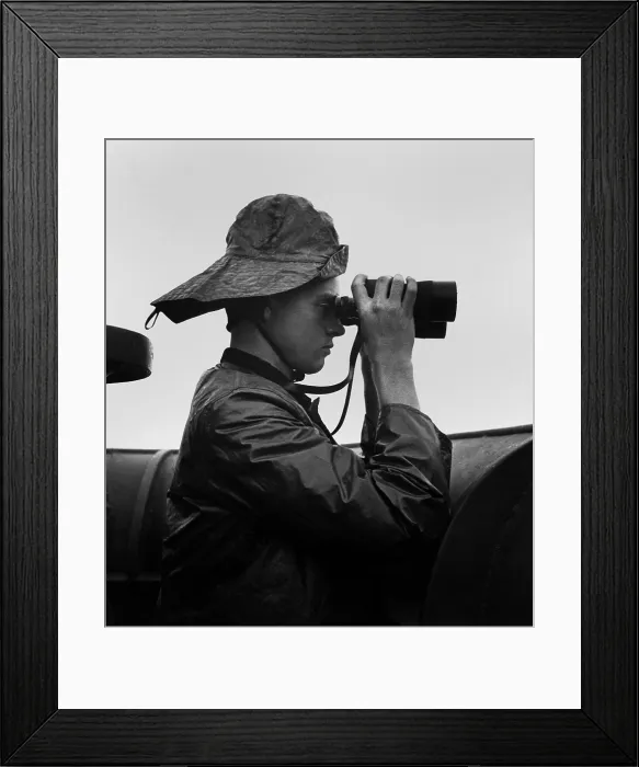 Framed Print : Sailor on duty at prow lookout aboard USS Nassau. Oct. 1943. World War 2, Pacific Ocean. (BSLOC_2013_13_13) Framed Print : Sailor on duty at prow lookout aboard USS Nassau. Oct. 1943. World War 2, Pacific Ocean. (BSLOC_2013_13_13)