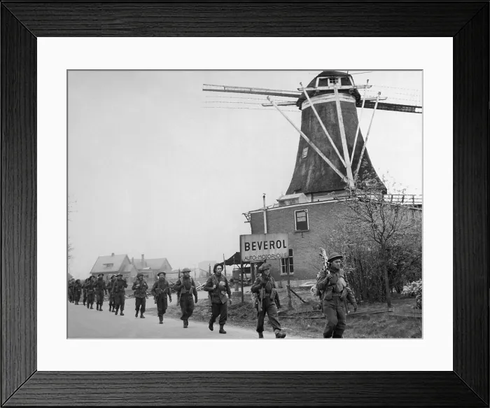 Framed Print : Canadian soldiers move through the Netherlands, marching from Holten to Rijssen. April 9, 1945 during World War 2. (BSLOC_2014_2_173)