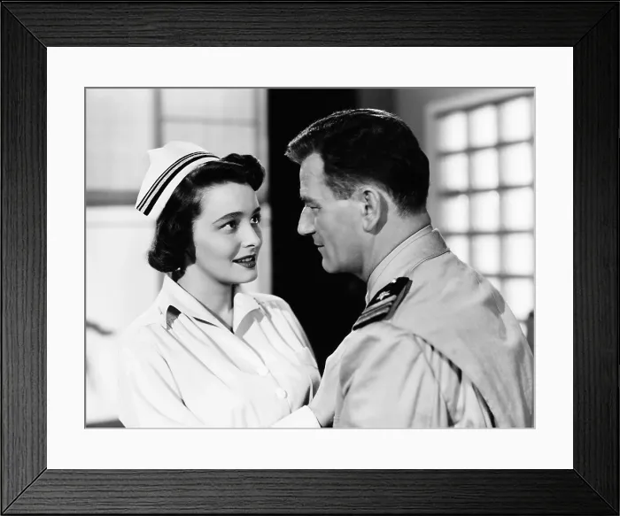 Framed Print : OPERATION PACIFIC, from left, Patricia Neal, John Wayne, 1951