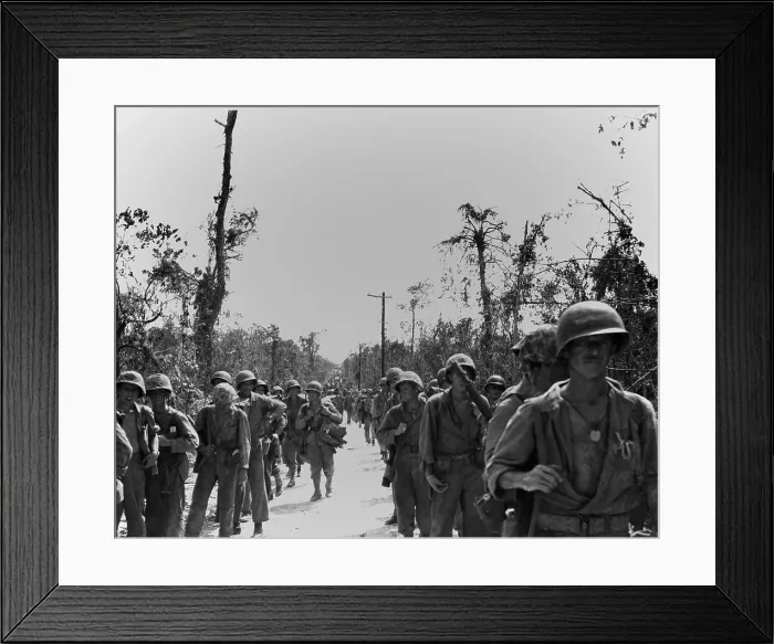 Framed Print : Marines advancing on a road toward the northern end of Peleliu Island. Sept.-Nov. 1944. World War 2, Pacific Ocean. (BSLOC_2013_13_26)