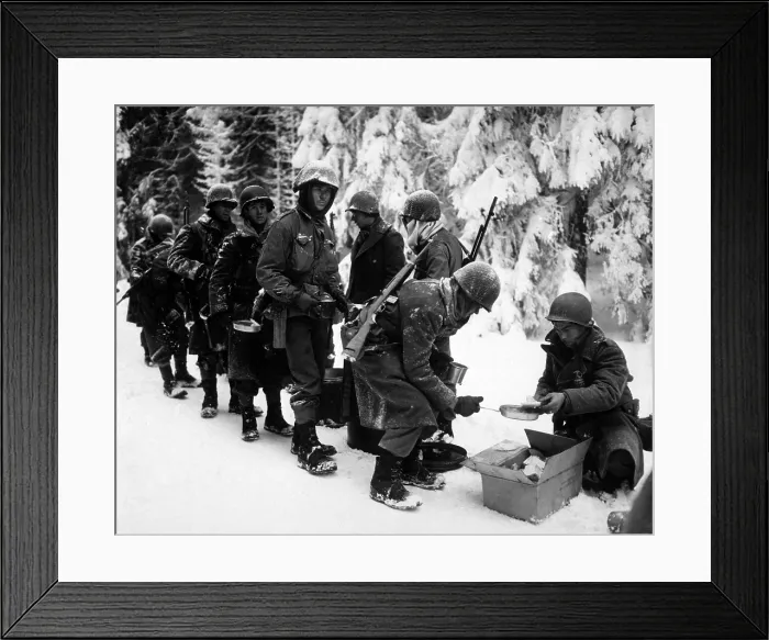 Framed Print : U.S. Infantrymen at field mess on their way to La Roche, Belgium. At this time the Germans were retreating, and Allies were on the offensive. January 13, 1945