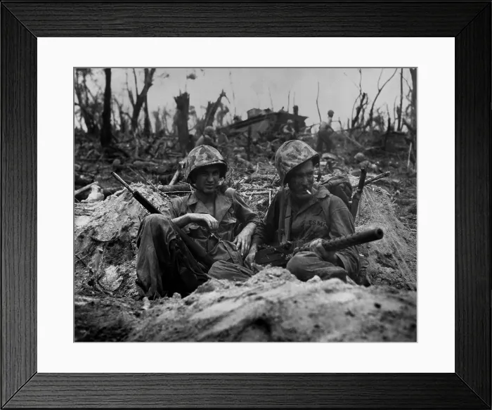 Framed Print : Marines smoke cigarettes, but keep their weapons close in a blasted landscape of Peleliu Island. Sept. 1944. World War 2, Pacific Ocean. (BSLOC_2013_13_32) Framed Print : Marines smoke cigarettes, but keep their weapons close in a blasted landscape of Peleliu Island. Sept. 1944. World War 2, Pacific Ocean. (BSLOC_2013_13_32)