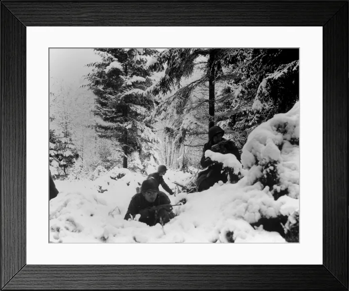 Framed Print : U.S. infantrymen of the 290th Regiment fight in fresh snowfall near Amonines, Belgium. January 4, 1945, Battle of the Bulge, World War 2. (BSLOC_2014_2_207)
