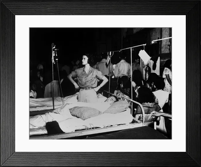 Framed Print : Army nurse checks a soldier's glucose drip in the 36th Evacuation Hospital, Leyte, Philippines Framed Print : Army nurse checks a soldier's glucose drip in the 36th Evacuation Hospital, Leyte, Philippines