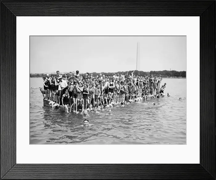 Framed Print : Warren Kealoha (lower left), Hawaiian Olympic swimmer, is cheered by swimmers at the Tidal Basin. Washington, D.C. Aug. 24, 1924