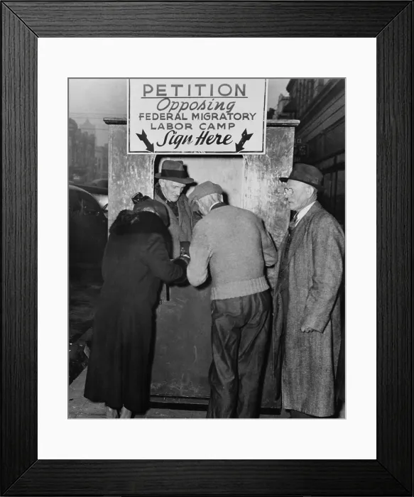 Framed Print : People sign a petition opposing establishment of government migratory labor camps in their community. The camps provided migrant workers with clean basic shelter Framed Print : People sign a petition opposing establishment of government migratory labor camps in their community. The camps provided migrant workers with clean basic shelter
