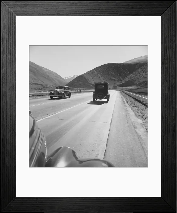 Framed Print : On U.S. 99. in Kern County on the Tehachapi Ridge. Migrants in an old car travel on the three lane highway between Imperial Valley and the San Joaquin Valley. Feb