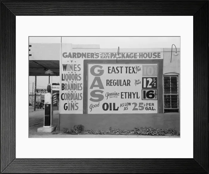 Framed Print : Gardener's Cut Rate Package House sign advertising alcoholic beverages and gasoline prices. Waco, Texas, Nov. 1939 Framed Print : Gardener's Cut Rate Package House sign advertising alcoholic beverages and gasoline prices. Waco, Texas, Nov. 1939