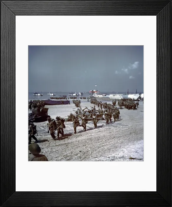 Framed Print : Canadians soldiers on Juno Beach, during the D-Day invasion, June 6, 1944. Troops walk over sand on wood slats that facilitate traffic. Normandy, France, World War 2 Framed Print : Canadians soldiers on Juno Beach, during the D-Day invasion, June 6, 1944. Troops walk over sand on wood slats that facilitate traffic. Normandy, France, World War 2