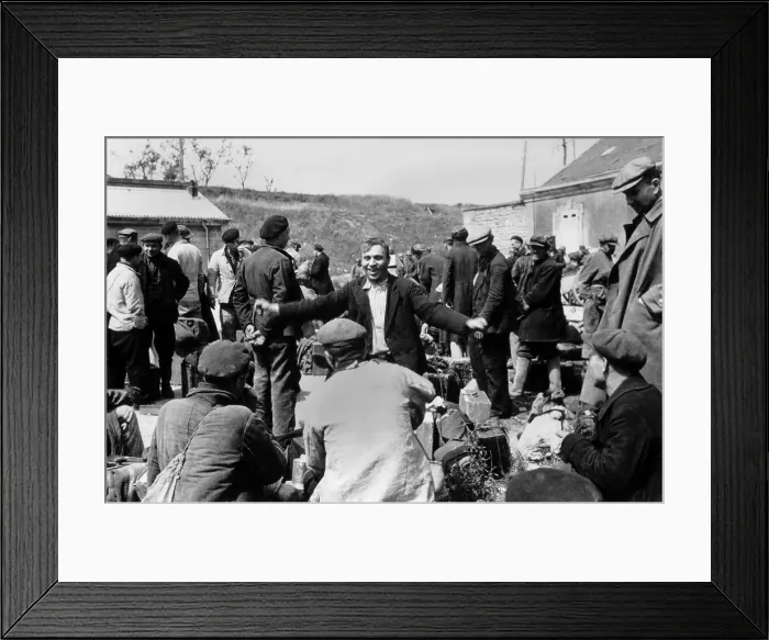 Framed Print : Russian forced laborers celebrate their release after the German surrender in Cherbourg, France Framed Print : Russian forced laborers celebrate their release after the German surrender in Cherbourg, France