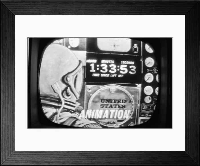 Framed Print : Television screen displaying a simulation of John Glenn in the Friendship 7 space capsule Framed Print : Television screen displaying a simulation of John Glenn in the Friendship 7 space capsule