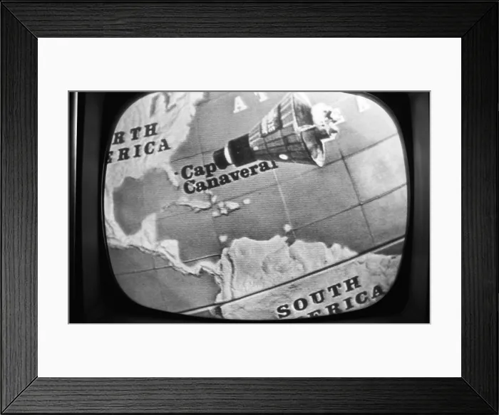 Framed Print : Television screen animation of John Glenn's Friendship 7 space capsule approaching North America, during his three orbit space flight on Feb. 20, 1962