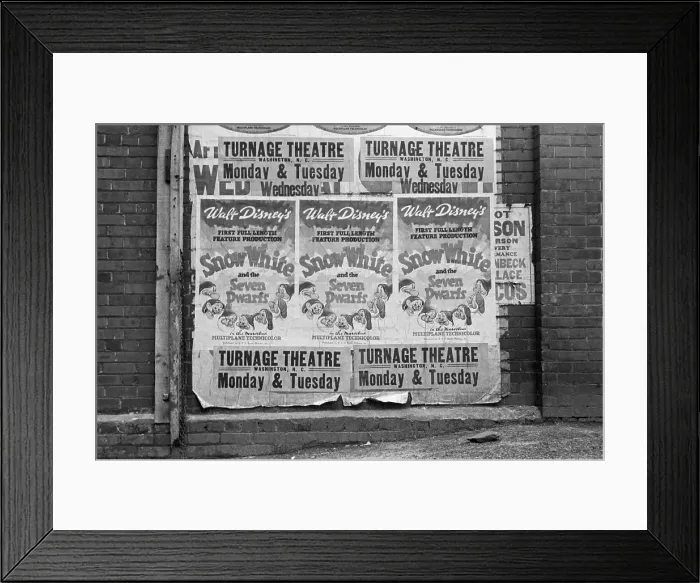 Framed Print : Posters advertising the Disney film, Snow White and the Seven Dwarfs, in Washington, North Carolina, April 1938 Framed Print : Posters advertising the Disney film, Snow White and the Seven Dwarfs, in Washington, North Carolina, April 1938