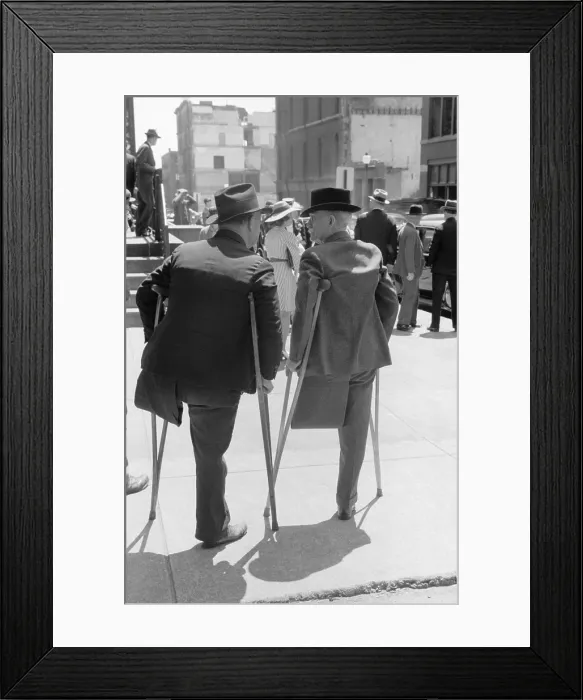 Framed Print : Two amputees on crutches outside church on Sunday morning, St. Louis, Missouri. May1940