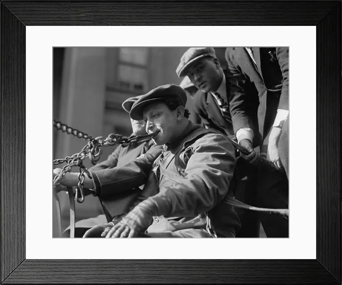 Framed Print : Strongman Sigmund Zishe Breitbar pulling a wagon-load of 50 people with his teeth. Washington, D.C. Nov 27, 1923. (BSLOC_2015_17_172)