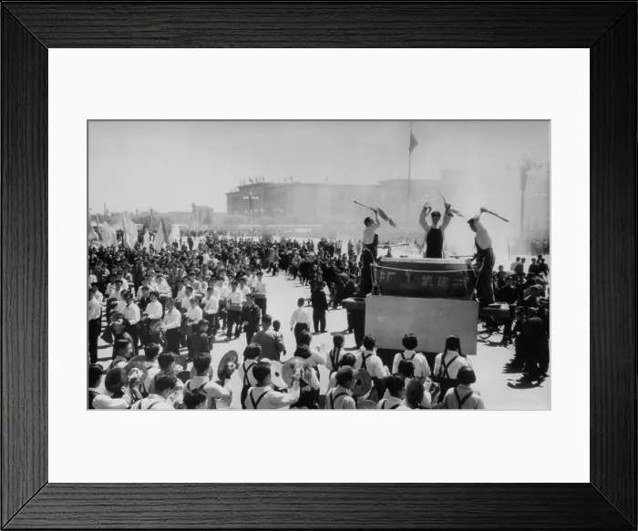 Framed Print : May Day in Beijing. People parade past a band with a massive drum. Tiananmen Square, Beijing, China. May 1, 1963
