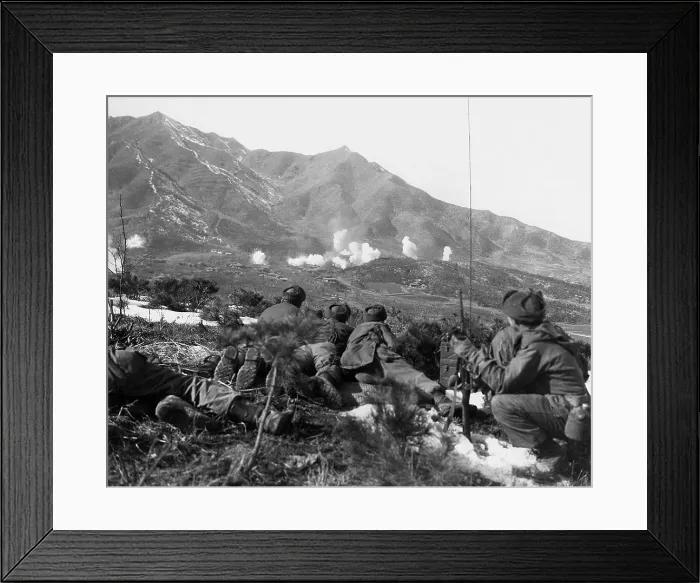 Framed Print : U.S. Soldiers outlook for movement as UN forces drop white phosphorous on a Communist held area. Feb. 1, 1951. Korean War, 1950-53. (BSLOC_2014_11_103)