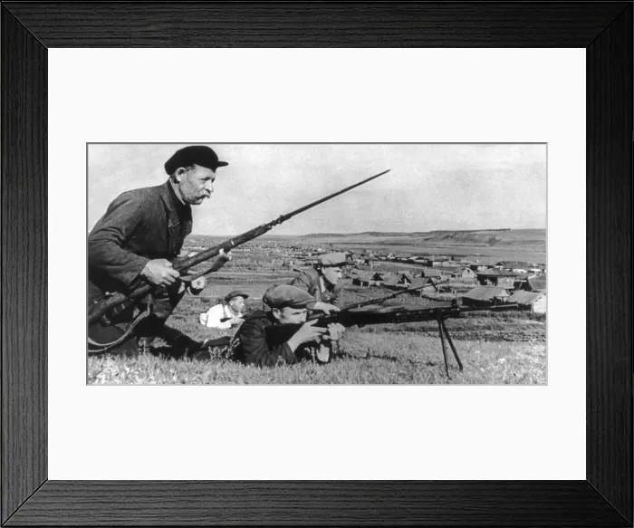 Framed Print : Four Soviet (Russian) partisans with fixed bayonets and small machine gun during World War 2