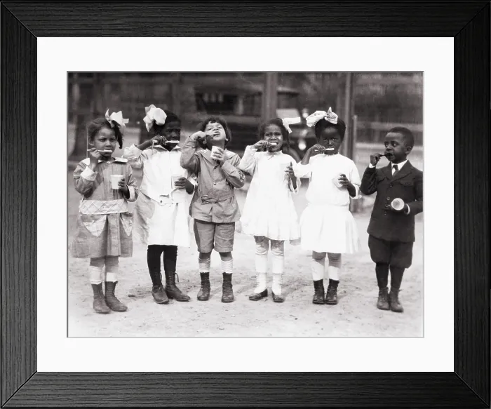 Framed Print : African American first graders learn to brush their teeth at the Miner Normal School near Washington, D.C. ca. 1910